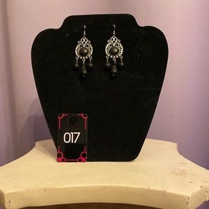 These black and silver color drop earrings will make any outfit really shine.